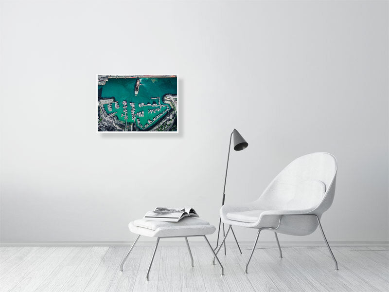 Arrival or departure of a cargo ship in a city port. Framed print photography art.