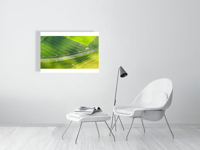 Green farm fields on a sunny day in early summer. Print or framed art photography.