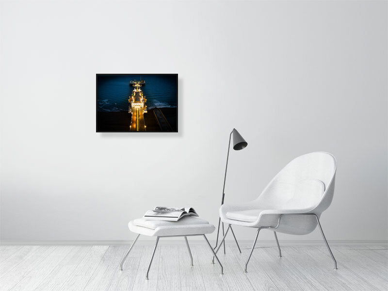 Brighton Pier in lights on a late evening. Framed print photography art.