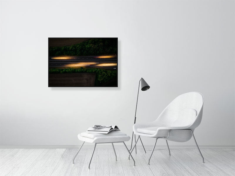 Aerial photo if motorway and light trails left by the cars. Print or framed art photography.