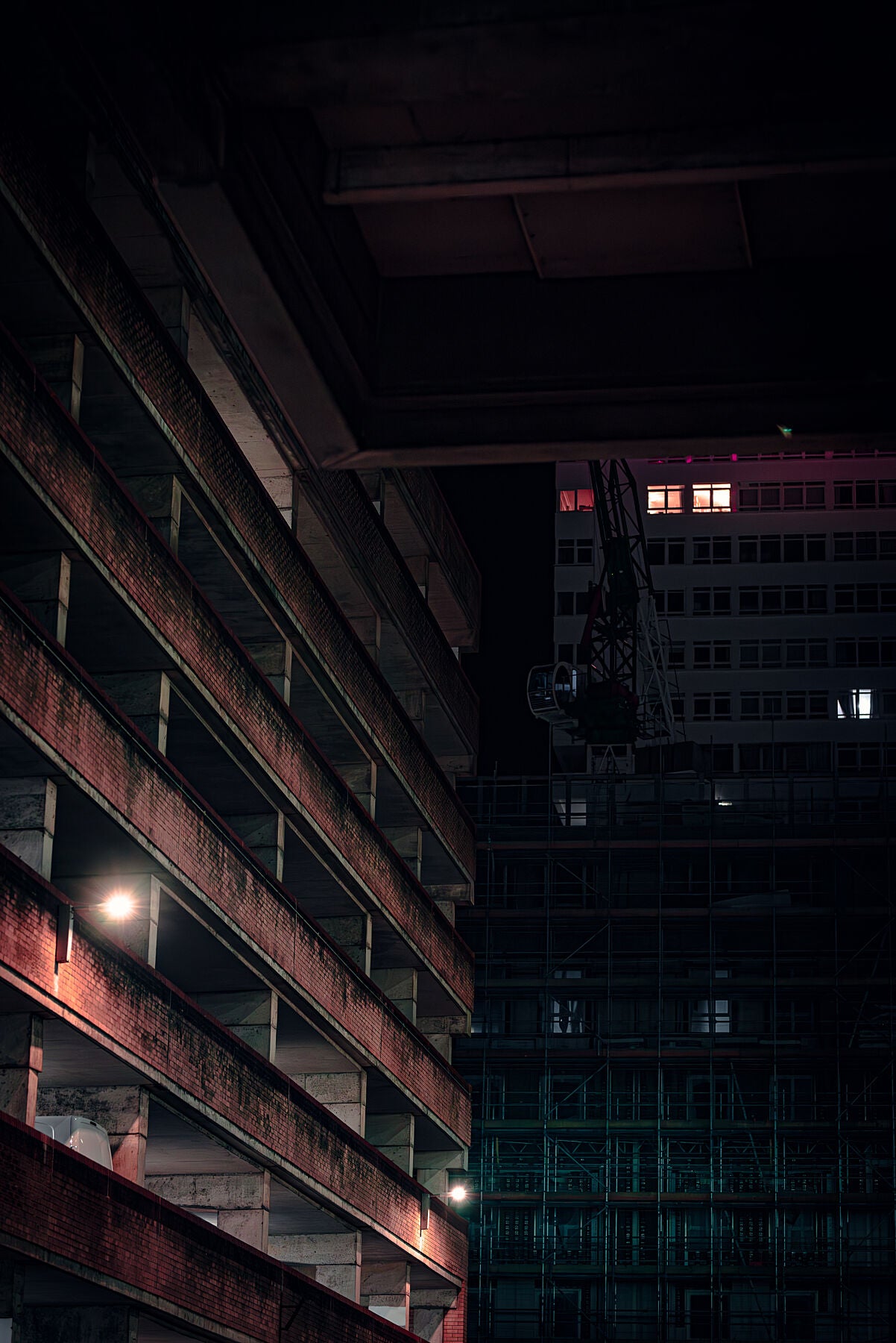 Night photo of architecture and building under renovation in centre of Brighton, print or framed art photography.