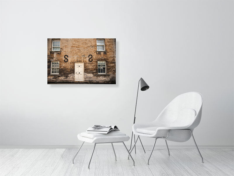 Old limescale brick building in historic town of Northleach, Cheltenham, Cotswold. Print or framed art photography, wall decor.