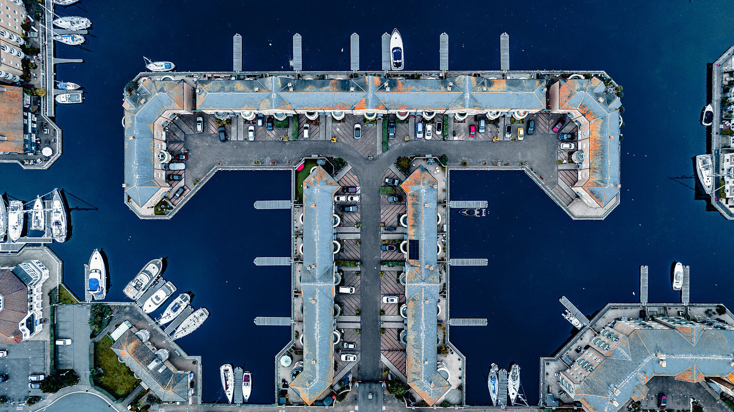 Aerial view of Brighton Marina blue waters with nice building geometry. Print of framed photography art.