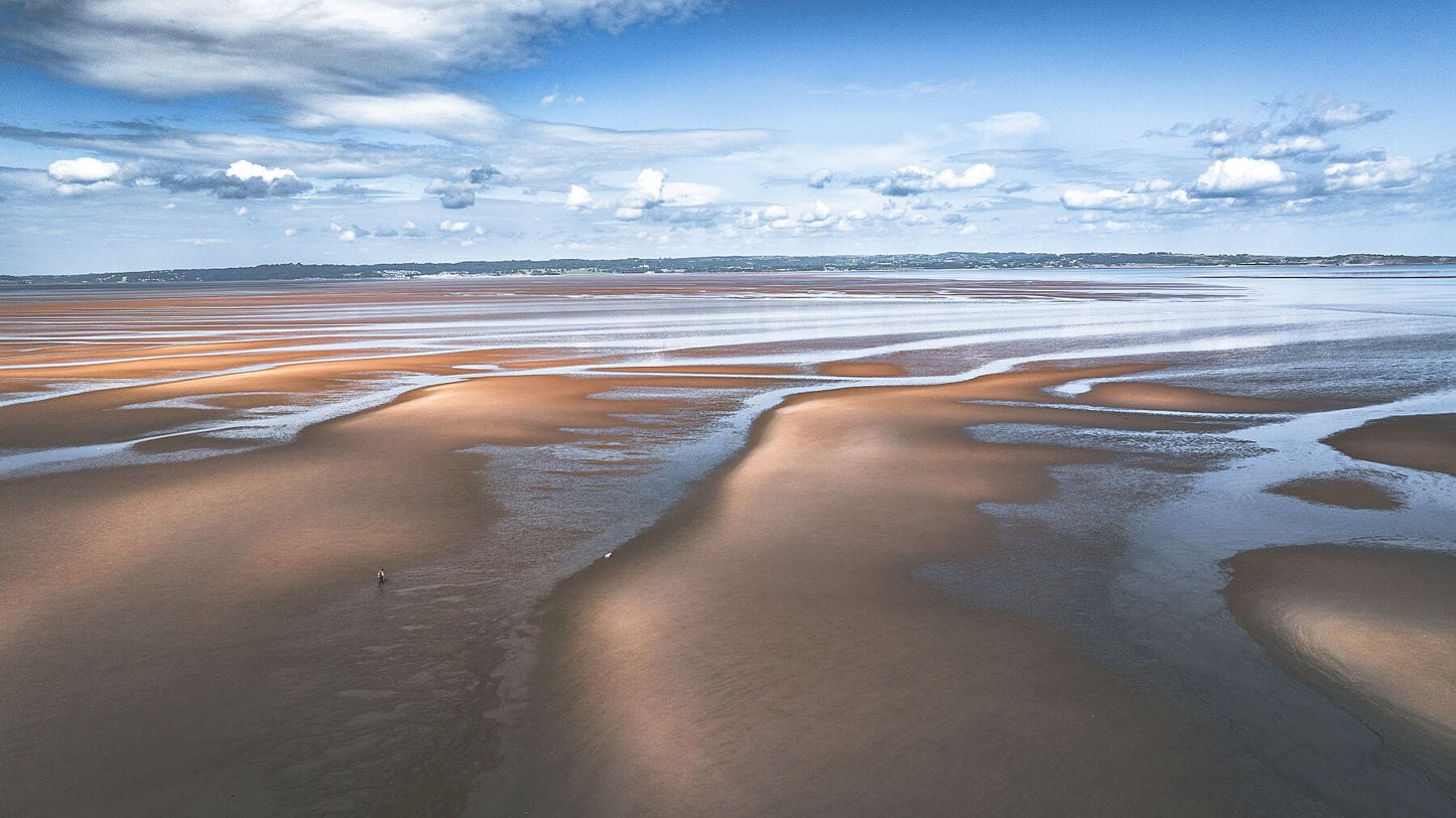 Dunes on a beach on a sunny day in Wales. Print or framed photography art.