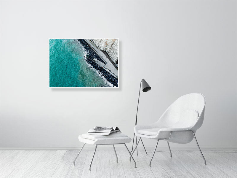 Walk right by the unrest waters of Rottingdean beach on a cold day. Print or framed photography art.