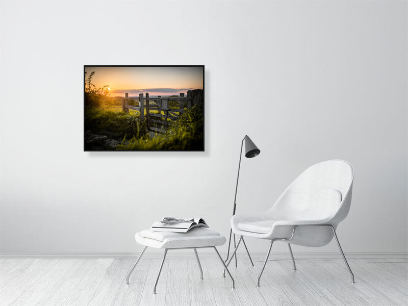 Gate in a wooden fence on a footpath toward a field on a tall hill close to Brighton. Printed or framed art photography.