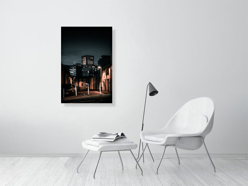 Office building poking out on a background of the residential side of city. Print of framed photography art.