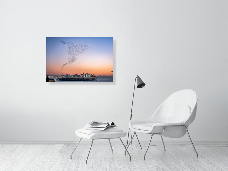 Starling Murmuration over colourful Brighton Pier on a calm sunny evening. Print or framed photography art.