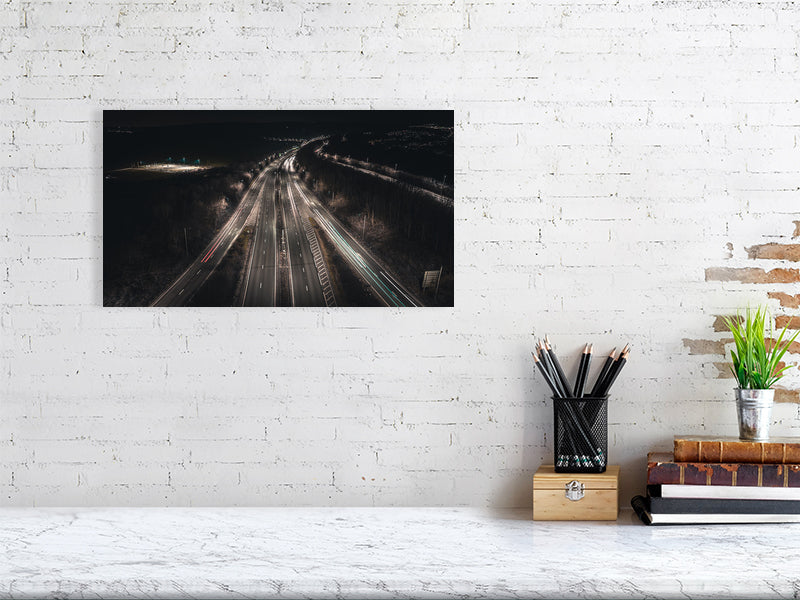 Night motorway by the city on a winter night. Print or framed art photography.