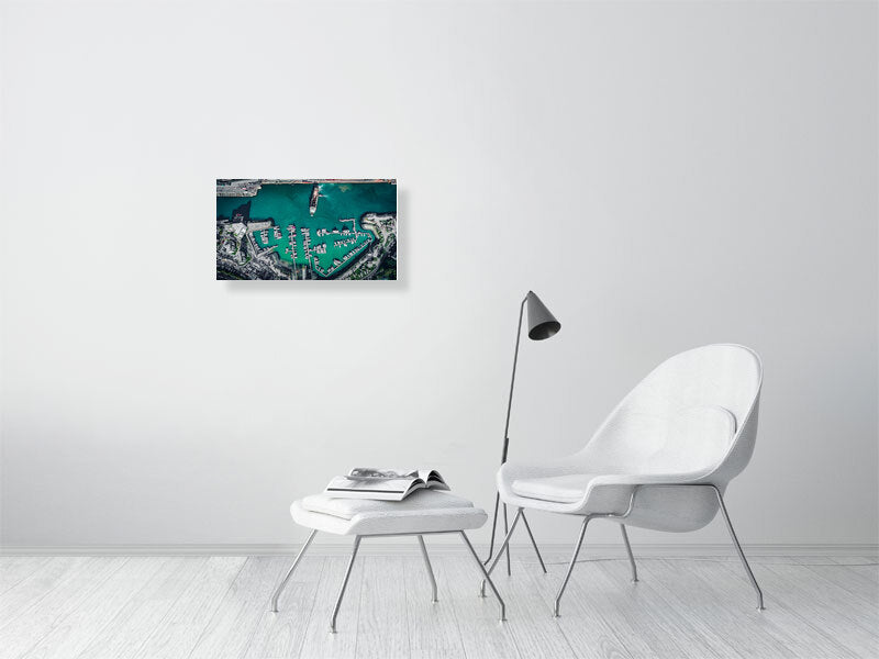 Arrival or departure of a cargo ship in a city port. Print photography art.