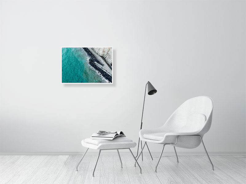 Walk right by the unrest waters of Rottingdean beach on a cold day. Print or framed photography art.