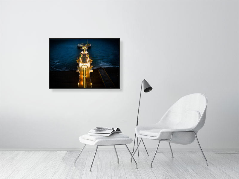 Brighton Pier in lights on a late evening. Framed print photography art.