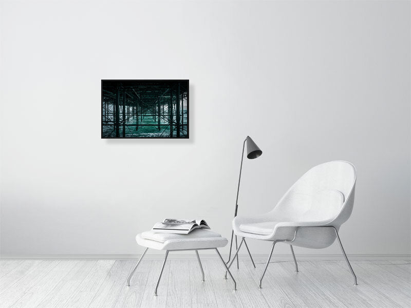 Base structure of Brighton Pier on a windy evening, Print or framed art photography.