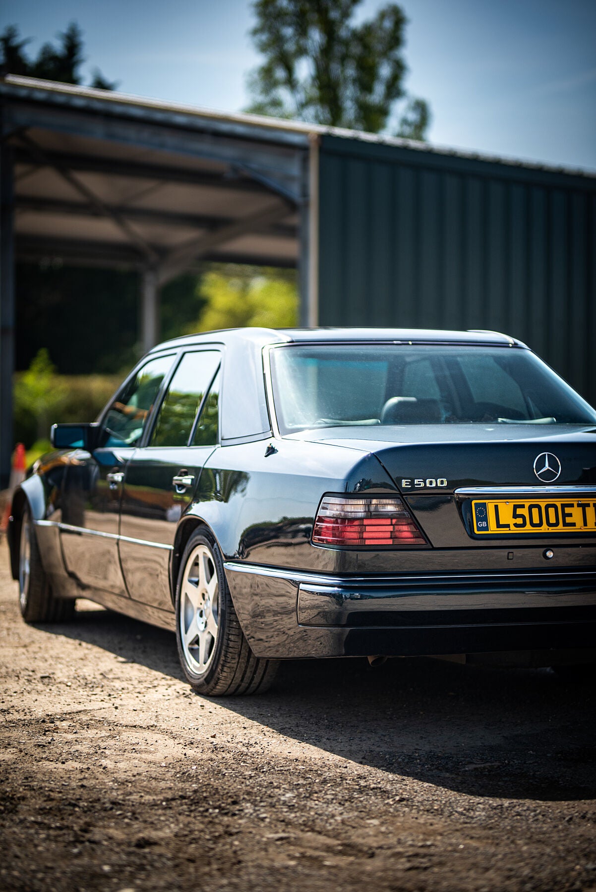 Classic Mercedes-Benz E-class W124 E500 equipped with M119 V8 engine. Print or framed art photography.