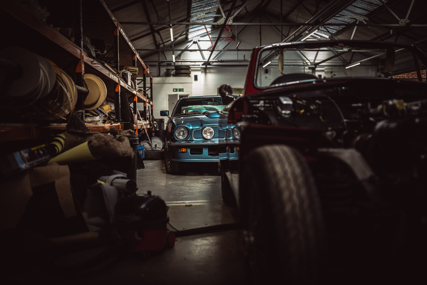 1973 classic Aston Martin V8 Series 3 parked up in a garage. Automotive Photography, classic car, vintage vehicle, car photography. Photo print, wall decor.
