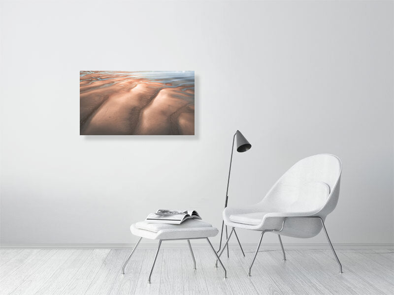 Man with the dog on a desert like beach on tide out, Wales. Print or framed photography art.