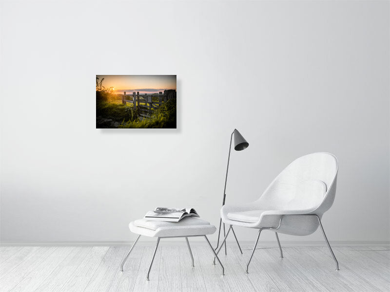 Gate in a wooden fence on a footpath toward a field on a tall hill close to Brighton. Printed or framed art photography.