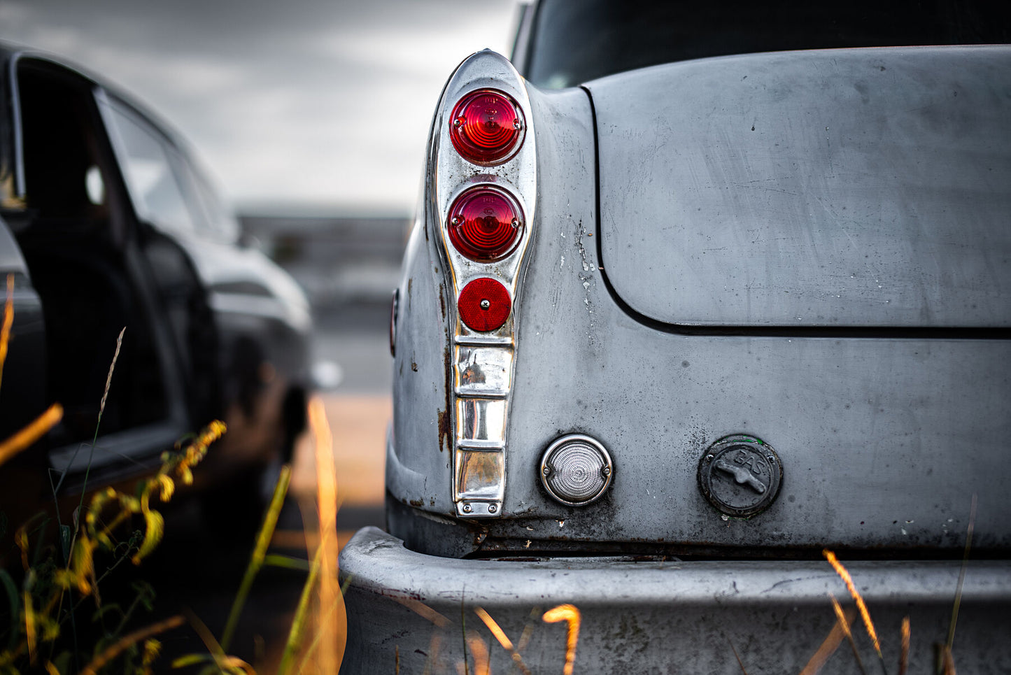 Old classic, American cab, used to be yellow taxi waiting for respray on calm evening. Print or framed art photography.
