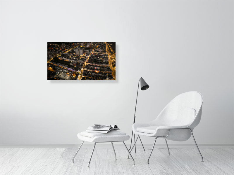 Aerial view of night Brighton with streetlights and web of bright roads. Print or framed art photography.
