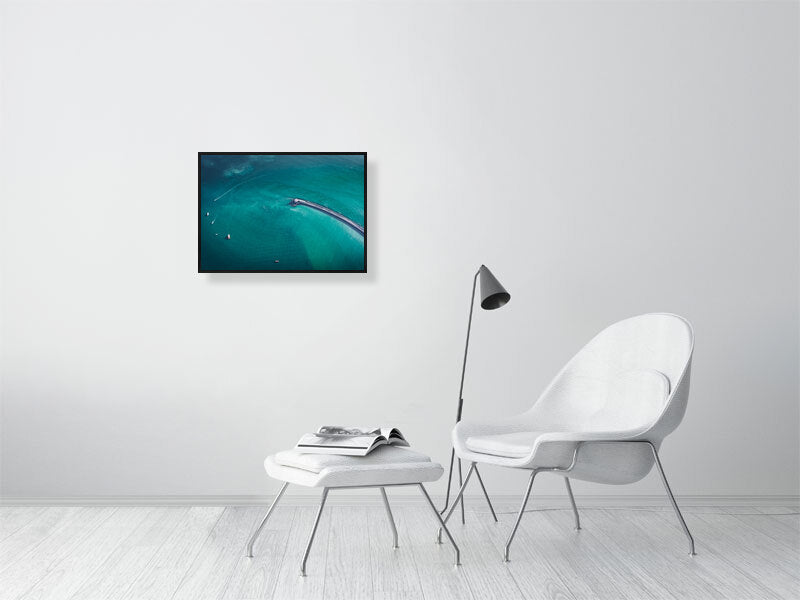 Lighthouse in blue waters of England. Framed print photography art.