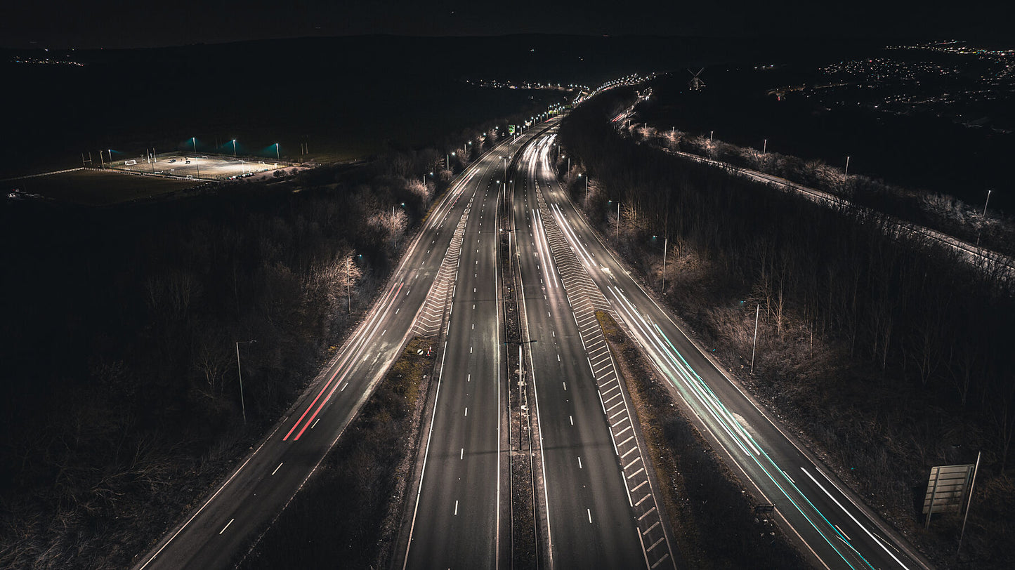 Night motorway by the city on a winter night. Print or framed art photography.