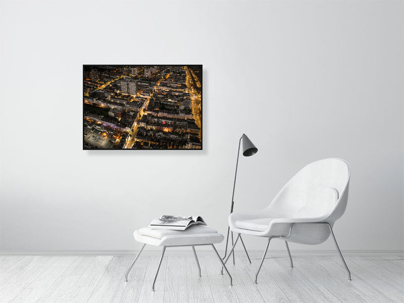 Aerial view of night Brighton with streetlights and web of bright roads. Print or framed art photography.