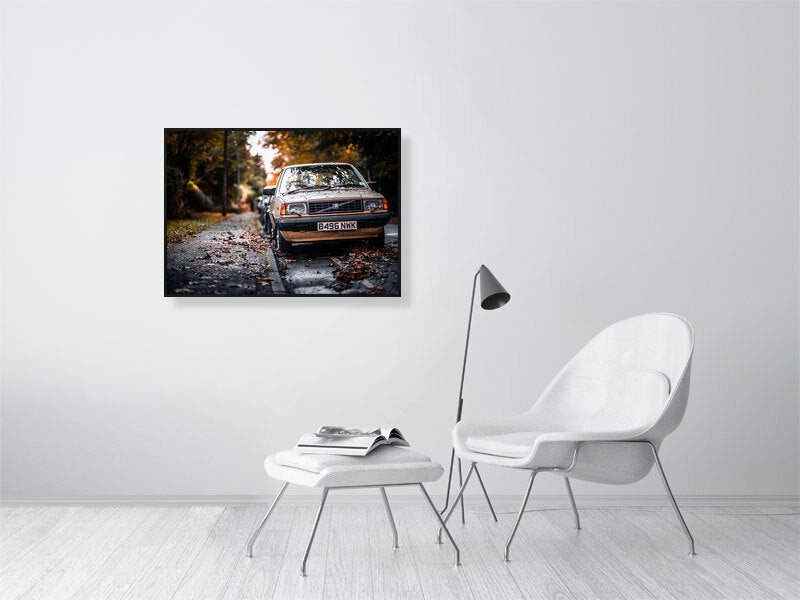 Old, classic Volvo in a colours of the fall on a wet but bright day. Print of framed photography art.