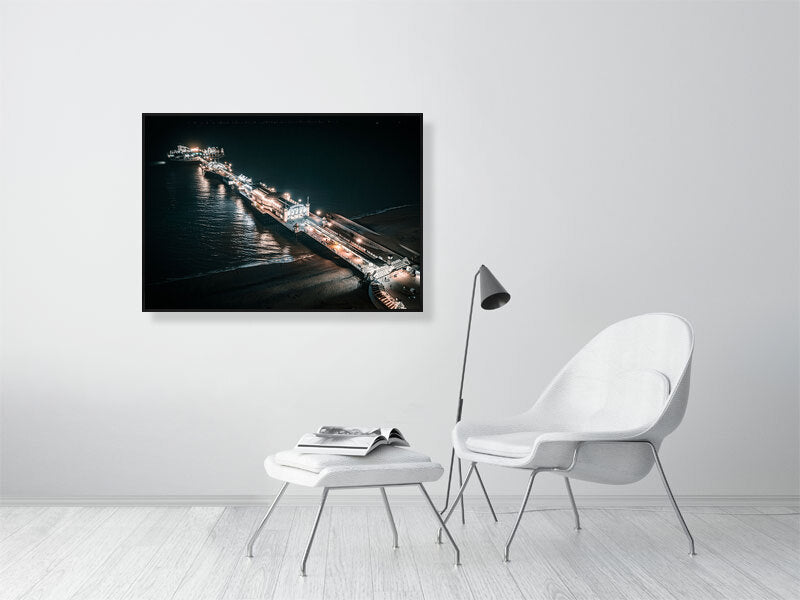 Brighton Pier on a cold winter Saturday night, surrounded by lights. Print or framed photography art.
