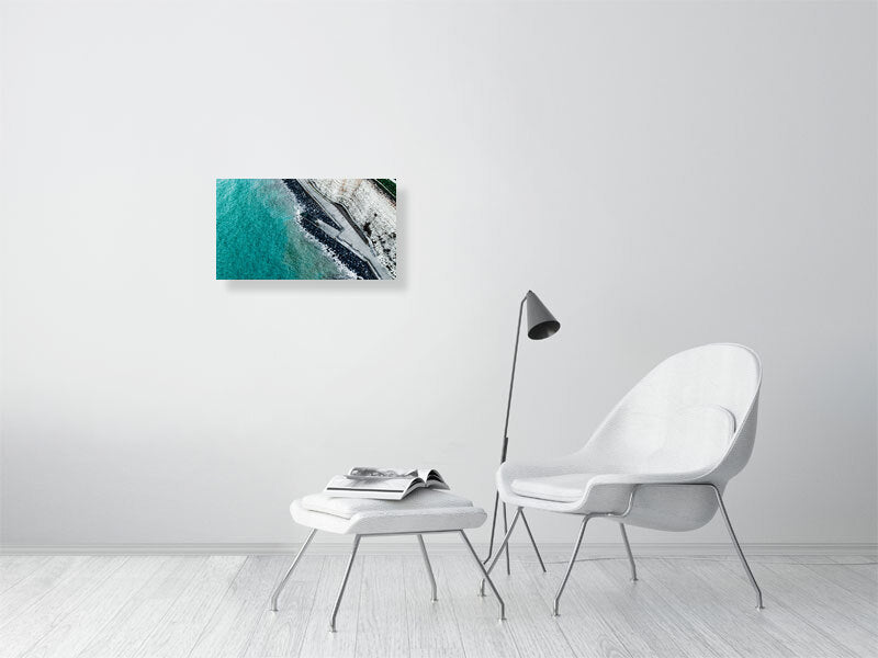 Walk right by the unrest waters of Rottingdean beach on a cold day. Print or framed photography art.