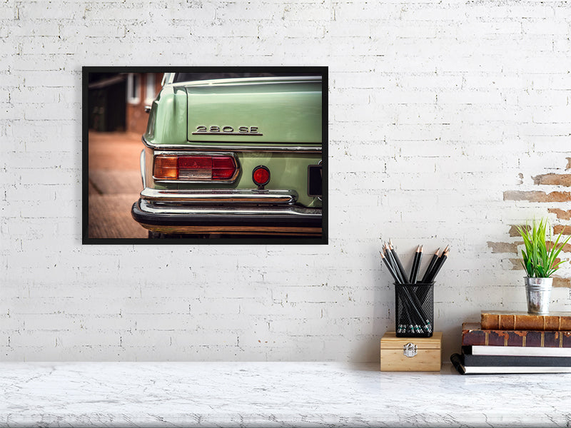 Classic, luxury Mercedes-Benz W109 W108 sitting outside the garage in a sunny day. Print or framed art photography.