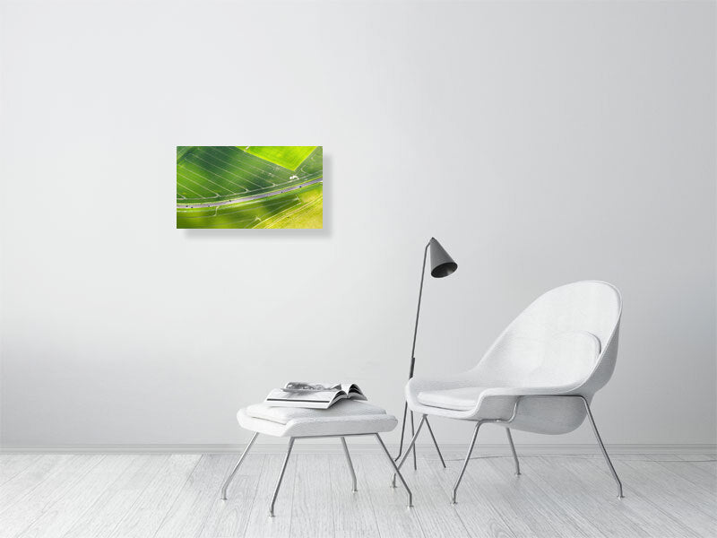 Green farm fields on a sunny day in early summer. Print or framed art photography.