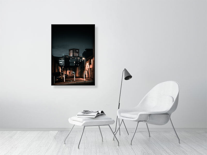 Office building poking out on a background of the residential side of city. Print of framed photography art.