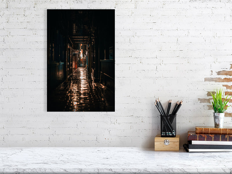 Brighton lanes on a rainy night reflecting lights of the street. Print or framed photography art.