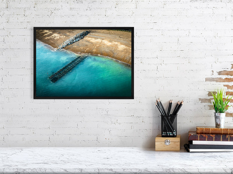 Aerial view of clear waters of West Sussex beach. Print or framed photography art.