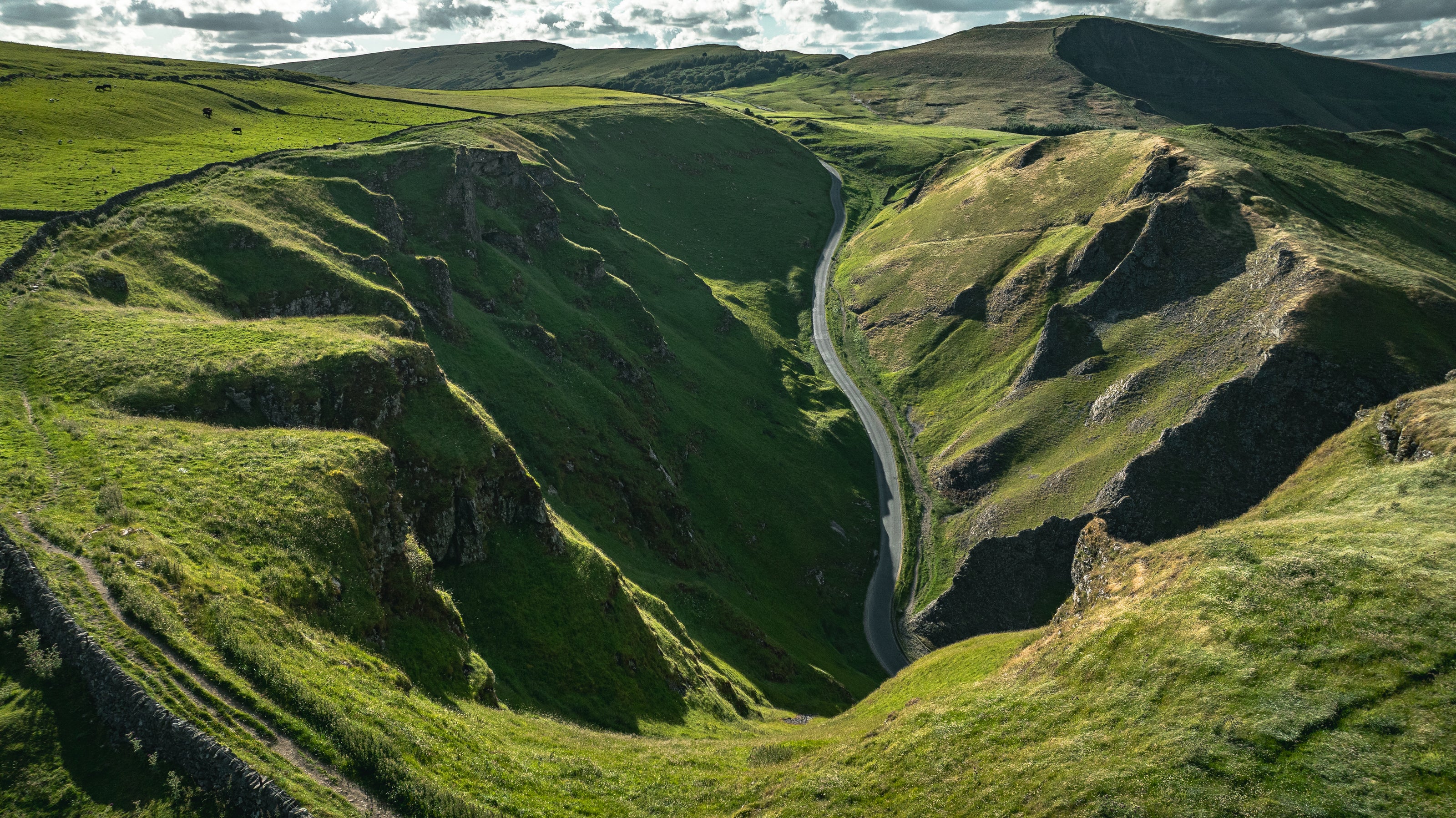 Winnats pass in Yorkshire on a cloudy but sunny day, aerial drone photography, photography print, framed or unframed photo art.