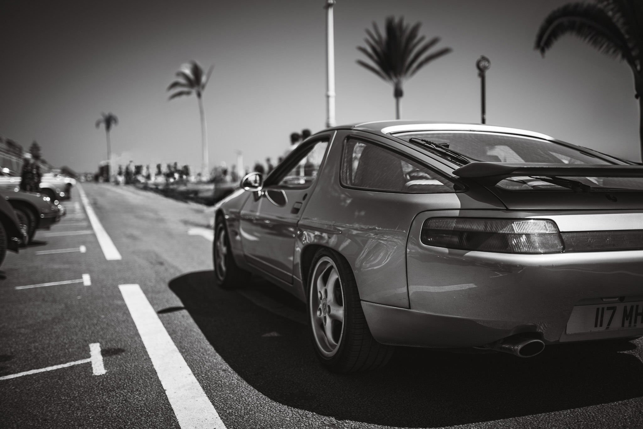 Classic Porsche 928 V8 on a seafront of Brighton, East Sussex, UK.
Printed on Giclée Hahnemühle Photo Rag, or Fuji Pearl. Photography print, unframed. Automotive art print.