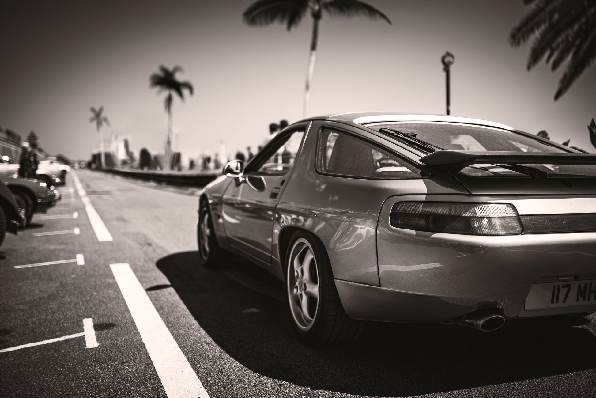 Classic Porsche 928 V8 on a seafront of Brighton, East Sussex, UK.
Printed on Giclée Hahnemühle Photo Rag, or Fuji Pearl. Photography print, unframed. Automotive art print.