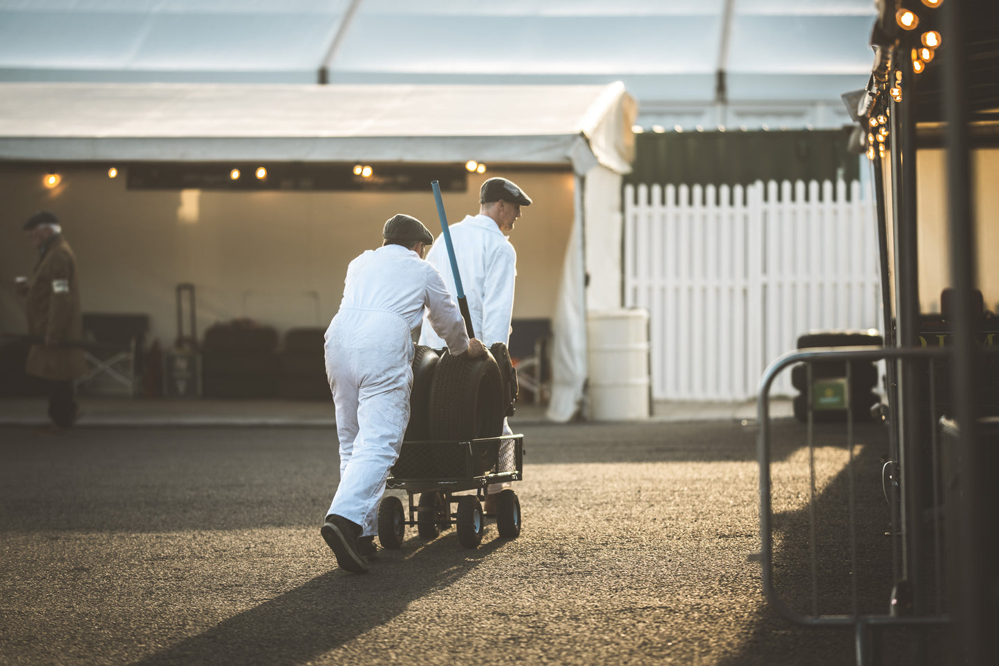 Pit stop movement at the end of a race in s sunset colours. Photography print, unframed. Automotive art print. Wall decor