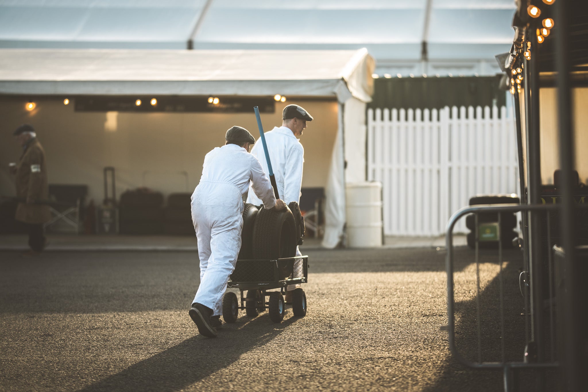 Pit stop movement at the end of a race in s sunset colours. Photography print, unframed. Automotive art print. Wall decor
