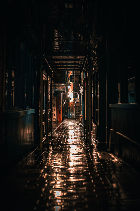 Brighton lanes on a rainy night reflecting lights of the street. Print or framed photography art.