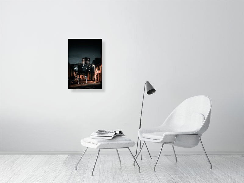 Office building poking out on a background of the residential side of city. Print of framed photography art.