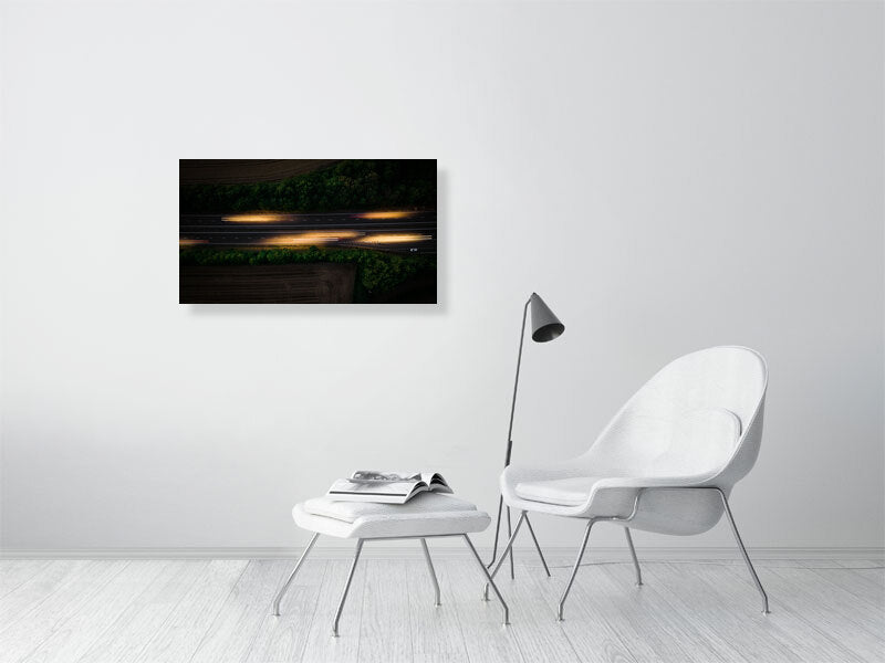 Aerial photo if motorway and light trails left by the cars. Print or framed art photography.